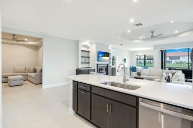 ****SIGNIFICANT PRICE IMPROVEMENT!*** JUST PACK YOUR PERSONAL on The Golf Club At Fiddlers Creek in Florida - for sale on GolfHomes.com, golf home, golf lot