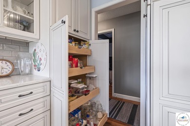 Stunning home located on the 9th hole of Meadow Lake Golf Course on Meadow Lake Golf Course in Missouri - for sale on GolfHomes.com, golf home, golf lot