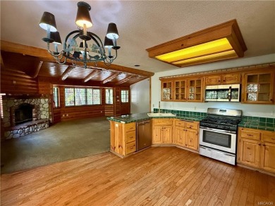 A true mountain escape in a premier Moonridge location--just a on Big Bear Mountain Ski and Golf Resort in California - for sale on GolfHomes.com, golf home, golf lot