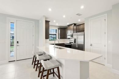****SIGNIFICANT PRICE IMPROVEMENT!*** JUST PACK YOUR PERSONAL on The Golf Club At Fiddlers Creek in Florida - for sale on GolfHomes.com, golf home, golf lot