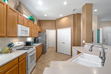 This popular open design MERION PLAN located on an INTERIOR LOT on Heritage Palms Golf Club in California - for sale on GolfHomes.com, golf home, golf lot