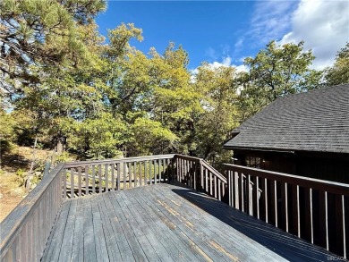 A true mountain escape in a premier Moonridge location--just a on Big Bear Mountain Ski and Golf Resort in California - for sale on GolfHomes.com, golf home, golf lot