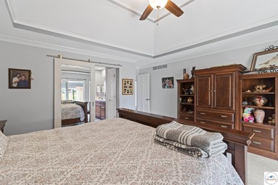 Stunning home located on the 9th hole of Meadow Lake Golf Course on Meadow Lake Golf Course in Missouri - for sale on GolfHomes.com, golf home, golf lot