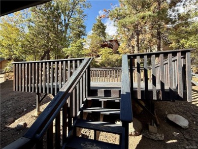 A true mountain escape in a premier Moonridge location--just a on Big Bear Mountain Ski and Golf Resort in California - for sale on GolfHomes.com, golf home, golf lot