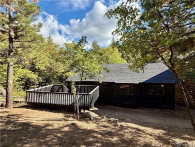 A true mountain escape in a premier Moonridge location--just a on Big Bear Mountain Ski and Golf Resort in California - for sale on GolfHomes.com, golf home, golf lot