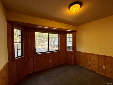 A true mountain escape in a premier Moonridge location--just a on Big Bear Mountain Ski and Golf Resort in California - for sale on GolfHomes.com, golf home, golf lot