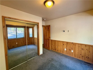 A true mountain escape in a premier Moonridge location--just a on Big Bear Mountain Ski and Golf Resort in California - for sale on GolfHomes.com, golf home, golf lot