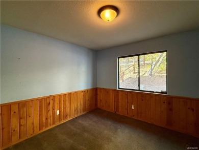 A true mountain escape in a premier Moonridge location--just a on Big Bear Mountain Ski and Golf Resort in California - for sale on GolfHomes.com, golf home, golf lot