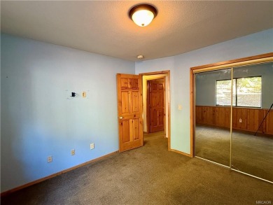A true mountain escape in a premier Moonridge location--just a on Big Bear Mountain Ski and Golf Resort in California - for sale on GolfHomes.com, golf home, golf lot