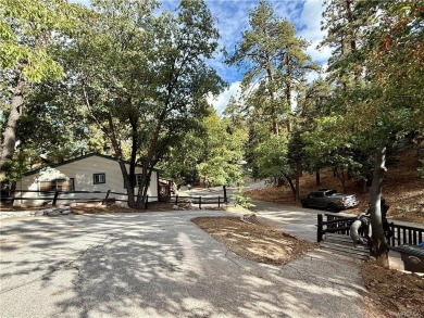 A true mountain escape in a premier Moonridge location--just a on Big Bear Mountain Ski and Golf Resort in California - for sale on GolfHomes.com, golf home, golf lot