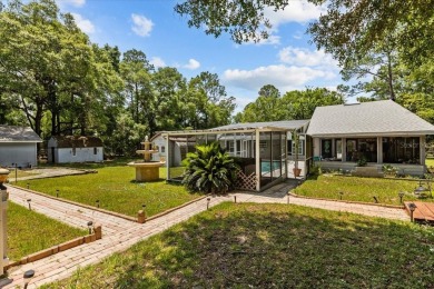 One or more photo(s) has been virtually staged. Gracious living on Rainbows End Golf Club in Florida - for sale on GolfHomes.com, golf home, golf lot