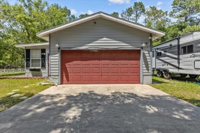 One or more photo(s) has been virtually staged. Gracious living on Rainbows End Golf Club in Florida - for sale on GolfHomes.com, golf home, golf lot