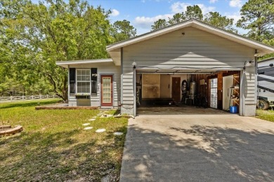 One or more photo(s) has been virtually staged. Gracious living on Rainbows End Golf Club in Florida - for sale on GolfHomes.com, golf home, golf lot