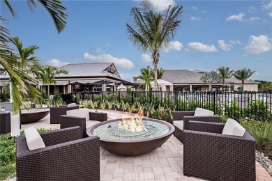 ****SIGNIFICANT PRICE IMPROVEMENT!*** JUST PACK YOUR PERSONAL on The Golf Club At Fiddlers Creek in Florida - for sale on GolfHomes.com, golf home, golf lot