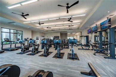****SIGNIFICANT PRICE IMPROVEMENT!*** JUST PACK YOUR PERSONAL on The Golf Club At Fiddlers Creek in Florida - for sale on GolfHomes.com, golf home, golf lot