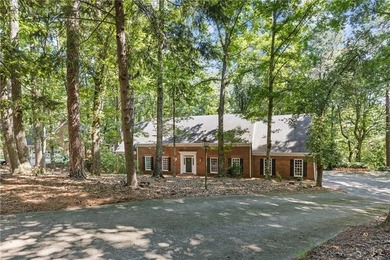 | OVER 1 ACRE || 5 BEDROOMS || MASTER ON MAIN || 5,115 SQ FT || on Cherokee Town and Country Club in Georgia - for sale on GolfHomes.com, golf home, golf lot