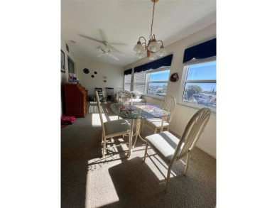 Experience the tranquility of waterfront living in this charming on Gulf Harbors Golf Course in Florida - for sale on GolfHomes.com, golf home, golf lot