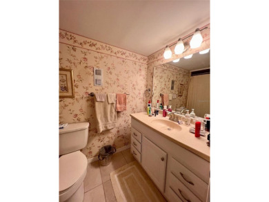 Experience the tranquility of waterfront living in this charming on Gulf Harbors Golf Course in Florida - for sale on GolfHomes.com, golf home, golf lot