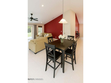 Gated Plantation Bay home with private preserve views and a on Plantation Bay Golf and Country Club in Florida - for sale on GolfHomes.com, golf home, golf lot