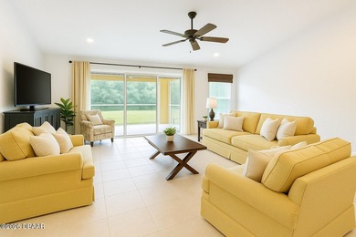 Gated Plantation Bay home with private preserve views and a on Plantation Bay Golf and Country Club in Florida - for sale on GolfHomes.com, golf home, golf lot