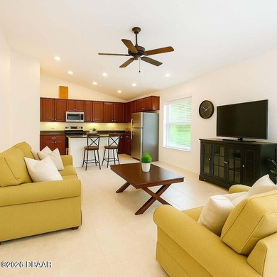 Gated Plantation Bay home with private preserve views and a on Plantation Bay Golf and Country Club in Florida - for sale on GolfHomes.com, golf home, golf lot