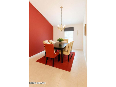 Gated Plantation Bay home with private preserve views and a on Plantation Bay Golf and Country Club in Florida - for sale on GolfHomes.com, golf home, golf lot