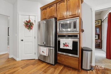 Welcome home to this beautiful 4-bedroom, 2.5-bath, two-story on Hunters Point Golf Club in Idaho - for sale on GolfHomes.com, golf home, golf lot