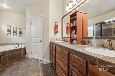 Welcome home to this beautiful 4-bedroom, 2.5-bath, two-story on Hunters Point Golf Club in ID - for sale on GolfHomes.com, golf home, golf lot