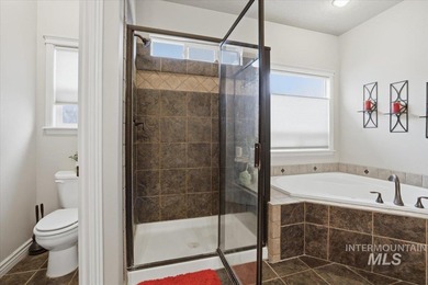 Welcome home to this beautiful 4-bedroom, 2.5-bath, two-story on Hunters Point Golf Club in ID - for sale on GolfHomes.com, golf home, golf lot