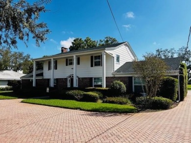 $100K PRICE CUT FROM ORIGINAL- REMODEL THIS BEAUTIFUL HOME TO on Bradenton Country Club in Florida - for sale on GolfHomes.com, golf home, golf lot