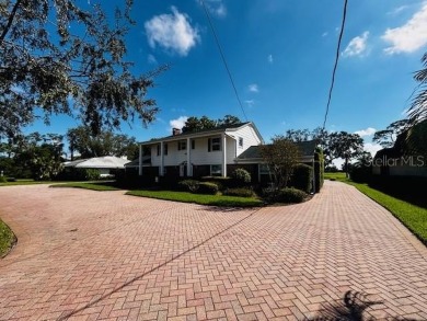 $100K PRICE CUT FROM ORIGINAL- REMODEL THIS BEAUTIFUL HOME TO on Bradenton Country Club in Florida - for sale on GolfHomes.com, golf home, golf lot