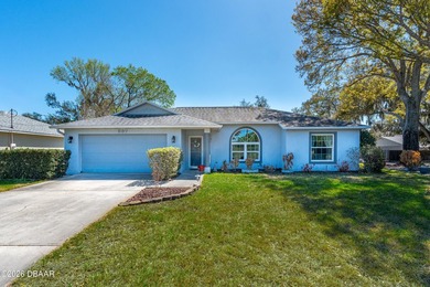 Welcome to this beautifully designed 3-bedroom, 2-bathroom home on Riviera Country Club in Florida - for sale on GolfHomes.com, golf home, golf lot