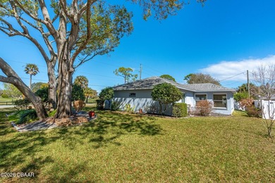 Welcome to this beautifully designed 3-bedroom, 2-bathroom home on Riviera Country Club in Florida - for sale on GolfHomes.com, golf home, golf lot