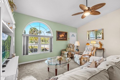 Welcome to this beautifully designed 3-bedroom, 2-bathroom home on Riviera Country Club in Florida - for sale on GolfHomes.com, golf home, golf lot