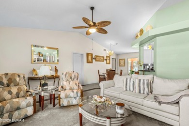 Welcome to this beautifully designed 3-bedroom, 2-bathroom home on Riviera Country Club in Florida - for sale on GolfHomes.com, golf home, golf lot