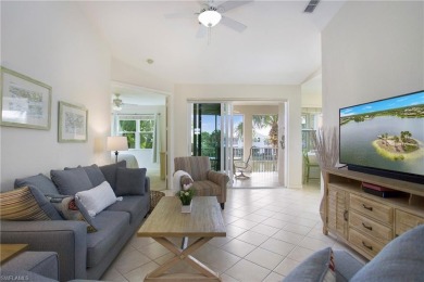 The current owners are using the spacious den with solid french on The Rookery At Marco in Florida - for sale on GolfHomes.com, golf home, golf lot