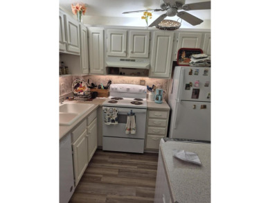Unlock the door to a vibrant lifestyle in stunning 1 BR, 1 BA on The American Golf Club in Florida - for sale on GolfHomes.com, golf home, golf lot