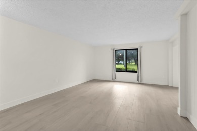 Enjoy peaceful views of the 14th fairway at Miles Grant Golf on Miles Grant Country Club in Florida - for sale on GolfHomes.com, golf home, golf lot