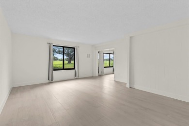 Enjoy peaceful views of the 14th fairway at Miles Grant Golf on Miles Grant Country Club in Florida - for sale on GolfHomes.com, golf home, golf lot