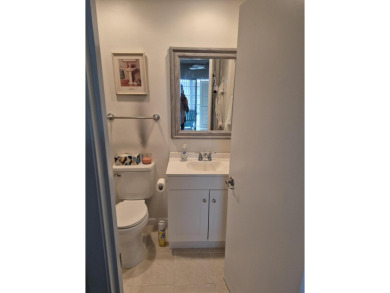Unlock the door to a vibrant lifestyle in stunning 1 BR, 1 BA on The American Golf Club in Florida - for sale on GolfHomes.com, golf home, golf lot