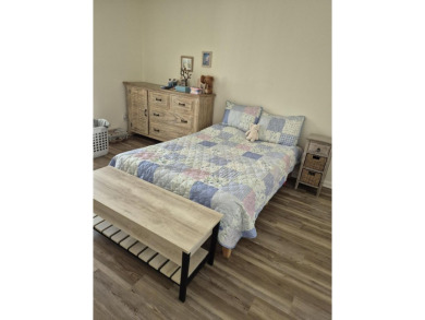 Unlock the door to a vibrant lifestyle in stunning 1 BR, 1 BA on The American Golf Club in Florida - for sale on GolfHomes.com, golf home, golf lot