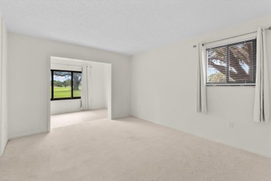 Enjoy peaceful views of the 14th fairway at Miles Grant Golf on Miles Grant Country Club in Florida - for sale on GolfHomes.com, golf home, golf lot