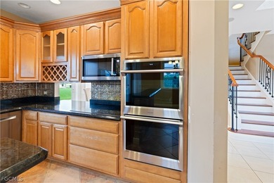 SPACIOUS 2-story Mediterranean-style home located in the on Royal Tee Country Club in Florida - for sale on GolfHomes.com, golf home, golf lot