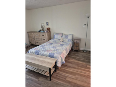 Unlock the door to a vibrant lifestyle in stunning 1 BR, 1 BA on The American Golf Club in Florida - for sale on GolfHomes.com, golf home, golf lot