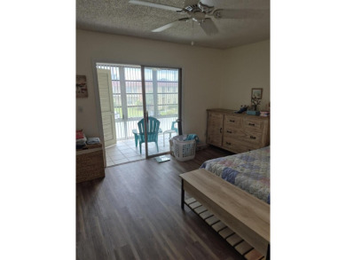 Unlock the door to a vibrant lifestyle in stunning 1 BR, 1 BA on The American Golf Club in Florida - for sale on GolfHomes.com, golf home, golf lot