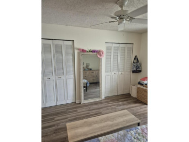 Unlock the door to a vibrant lifestyle in stunning 1 BR, 1 BA on The American Golf Club in Florida - for sale on GolfHomes.com, golf home, golf lot