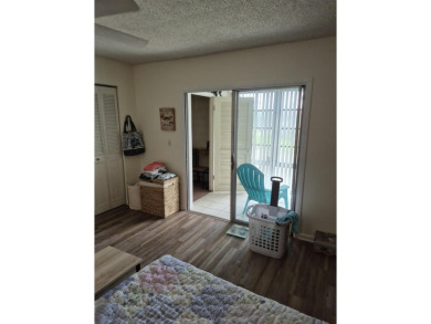 Unlock the door to a vibrant lifestyle in stunning 1 BR, 1 BA on The American Golf Club in Florida - for sale on GolfHomes.com, golf home, golf lot