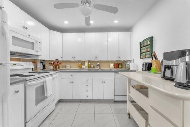 Enjoy South Florida living with this 2Bed/2Bath second floor on Hillsboro Pines Golf in Florida - for sale on GolfHomes.com, golf home, golf lot