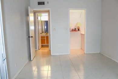 Enjoy South Florida living with this 2Bed/2Bath second floor on Hillsboro Pines Golf in Florida - for sale on GolfHomes.com, golf home, golf lot