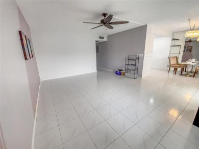 Enjoy South Florida living with this 2Bed/2Bath second floor on Hillsboro Pines Golf in Florida - for sale on GolfHomes.com, golf home, golf lot